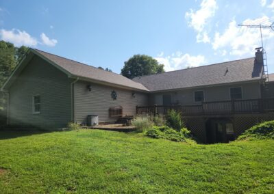 home with beige siding and roof