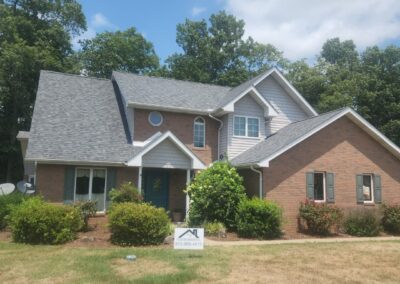 brick house with shingles